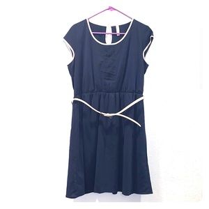 Blue sleeveless special occasion dress.